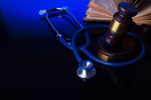 Hand holding law gavel