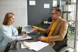 Manager with disability working in social service